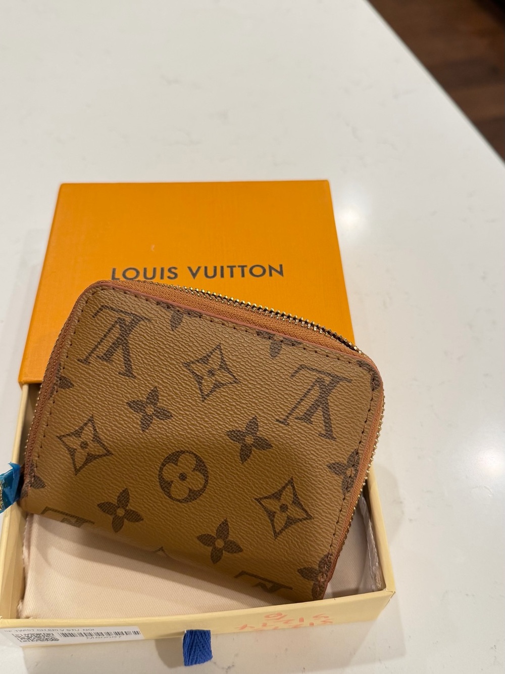 Louis Vuitton Monogram Zip Card Holder in Brown